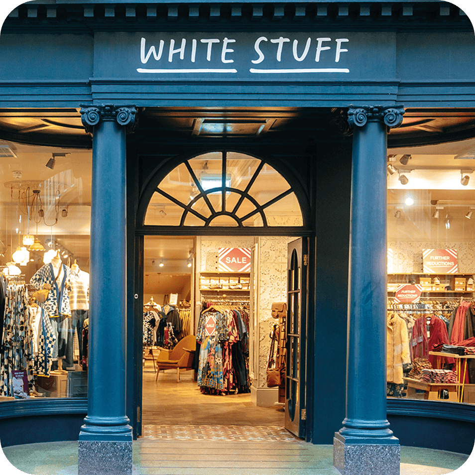 a store front with a sign that says white stuff